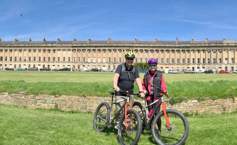 Couple with bikes at Royal Crescent